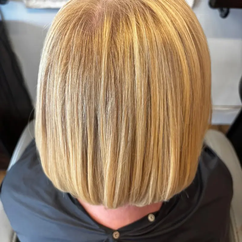 Glossy blonde blunt bob, neatly finished